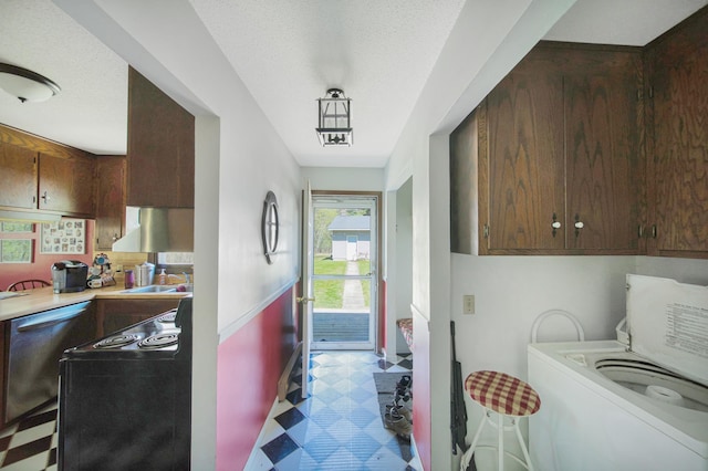 1418 345th Ave, Frederic, WI 54837 - clothes washing area featuring light floors and washer / clothes dryer