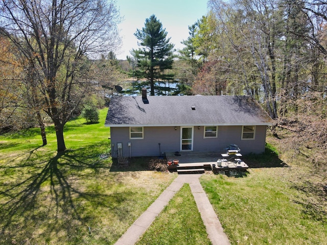 1418 345th Ave, Frederic, WI 54837 - back of house featuring a yard and a wooden deck