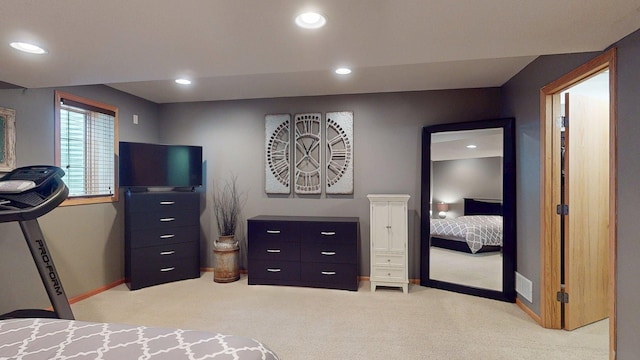 bedroom featuring light colored carpet, baseboards, and recessed lighting
