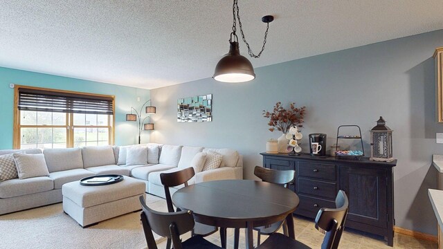living room featuring a textured ceiling