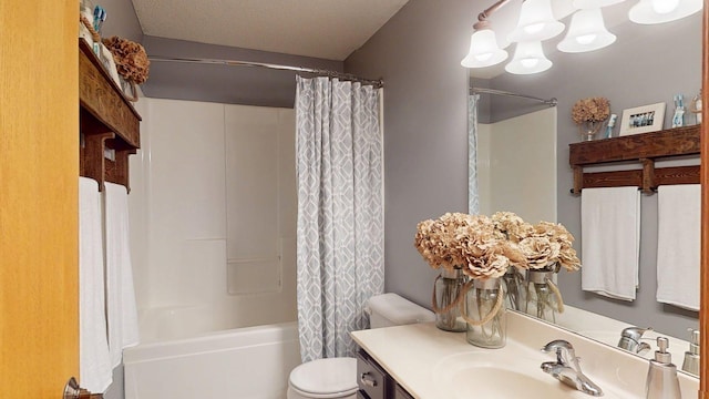 full bathroom featuring toilet, vanity, shower / bath combination with curtain, and a chandelier