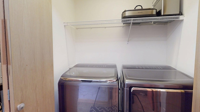 washroom featuring separate washer and dryer