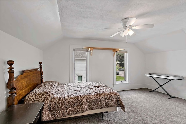 706 Broad St, Mankato, MN 56001 - carpeted bedroom with vaulted ceiling, ceiling fan, a textured ceiling, and baseboards