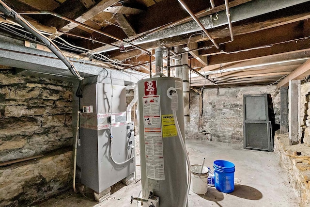 706 Broad St, Mankato, MN 56001 - unfinished below grade area featuring water heater and heating unit