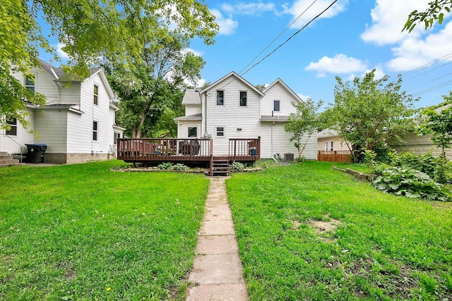 706 Broad St, Mankato, MN 56001 - rear view of property featuring a wooden deck and central AC