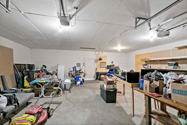 706 Broad St, Mankato, MN 56001 - garage featuring a garage door opener