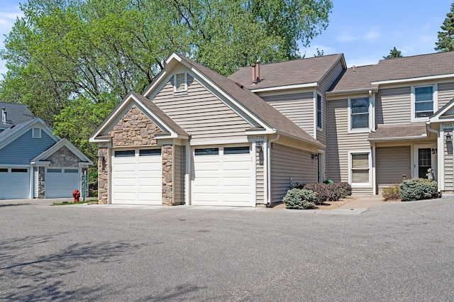 view of property with stone siding