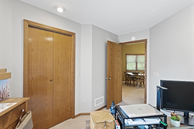 office space with light colored carpet