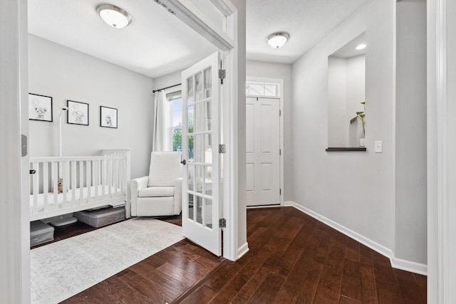8172 Virginia Ln, Savage, MN 55378 - foyer featuring baseboards and wood finished floors