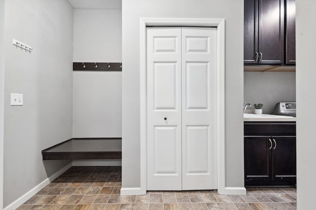 8172 Virginia Ln, Savage, MN 55378 - laundry room with cabinet space and baseboards
