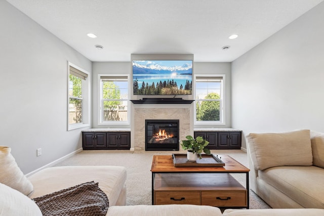 8172 Virginia Ln, Savage, MN 55378 - carpeted living room with a fireplace, plenty of natural light, baseboards, and recessed lighting