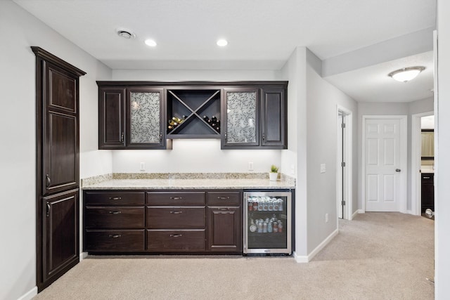 8172 Virginia Ln, Savage, MN 55378 - indoor bar with beverage cooler, light carpet, baseboards, and recessed lighting