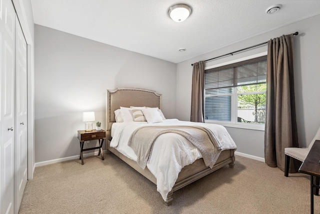 8172 Virginia Ln, Savage, MN 55378 - bedroom with light colored carpet, baseboards, and a closet