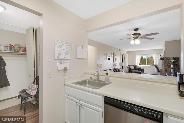 3300 Louisiana Ave S Unit 517, Saint Louis Park, MN 55426 - kitchen featuring dishwasher, a sink, wood finished floors, light countertops, and a ceiling fan