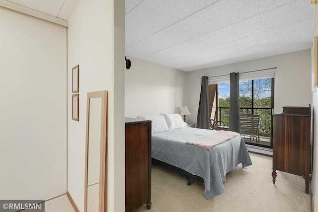 3300 Louisiana Ave S Unit 517, Saint Louis Park, MN 55426 - bedroom featuring light colored carpet and access to exterior