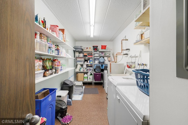 3300 Louisiana Ave S Unit 517, Saint Louis Park, MN 55426 - clothes washing area featuring washer and clothes dryer, carpet, and a textured ceiling
