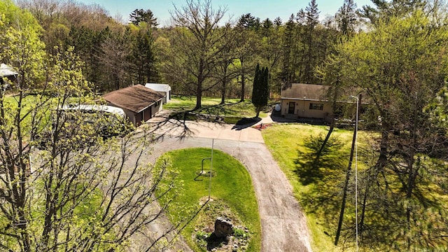 view from above of property featuring a forest