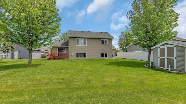 2647 Olive Ln, Sauk Rapids, MN 56379 - rear view of property featuring a wooden deck and a shingled roof