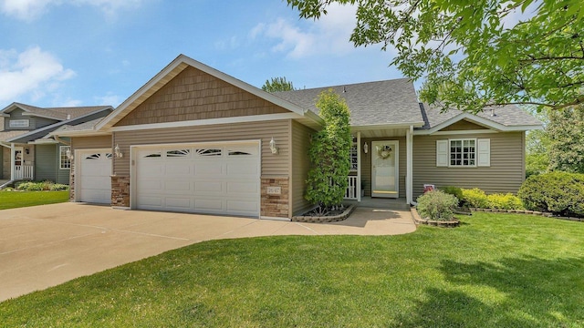 2647 Olive Ln, Sauk Rapids, MN 56379 - view of front facade featuring an attached garage, a front lawn, driveway, and a shingled roof