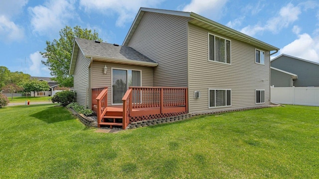 2647 Olive Ln, Sauk Rapids, MN 56379 - rear view of property featuring a wooden deck
