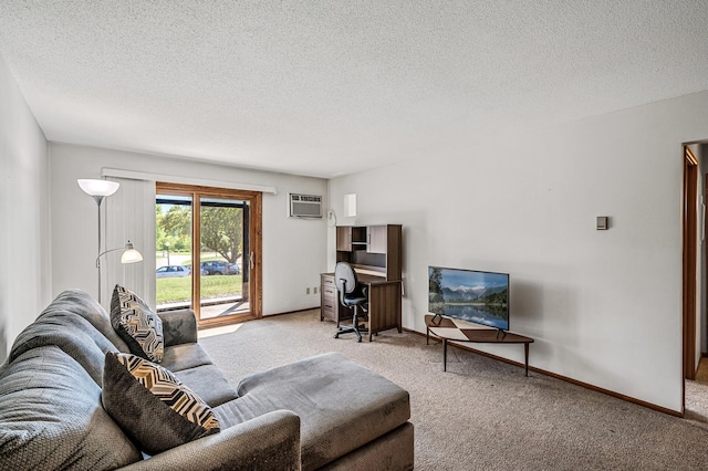 2700 Oxford St N Unit 102, Roseville, MN 55113 - carpeted living area featuring a wall mounted air conditioner, a textured ceiling, and baseboards