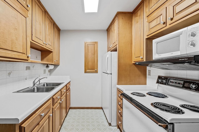 2700 Oxford St N Unit 102, Roseville, MN 55113 - kitchen featuring white appliances, a sink, backsplash, and light countertops