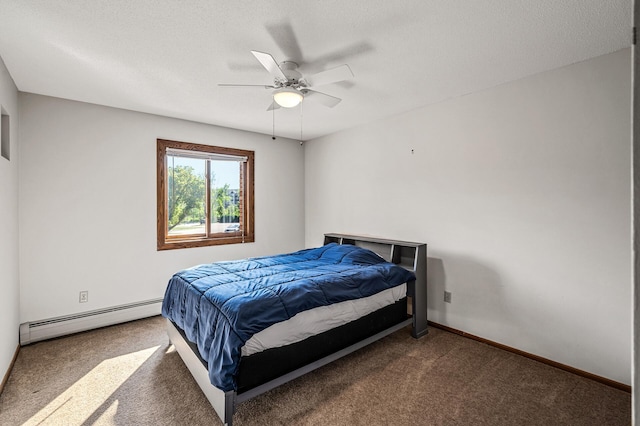 2700 Oxford St N Unit 102, Roseville, MN 55113 - carpeted bedroom featuring baseboard heating, ceiling fan, and baseboards