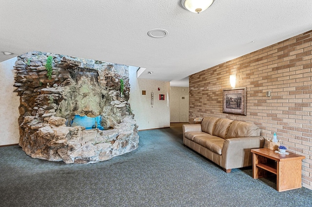 2700 Oxford St N Unit 102, Roseville, MN 55113 - living area with carpet floors, a textured ceiling, and brick wall