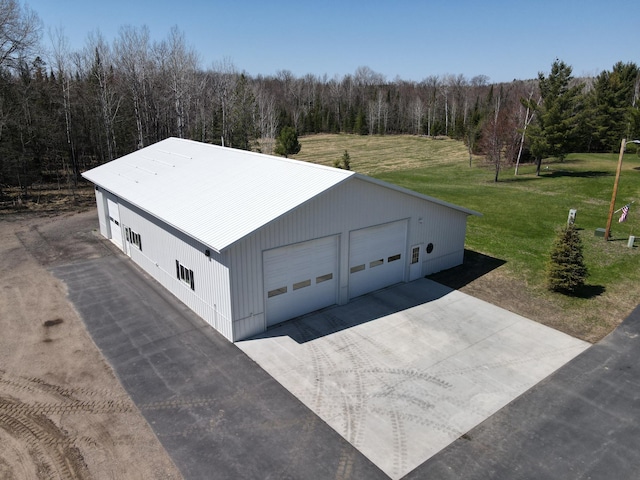 view from above of property featuring a forest