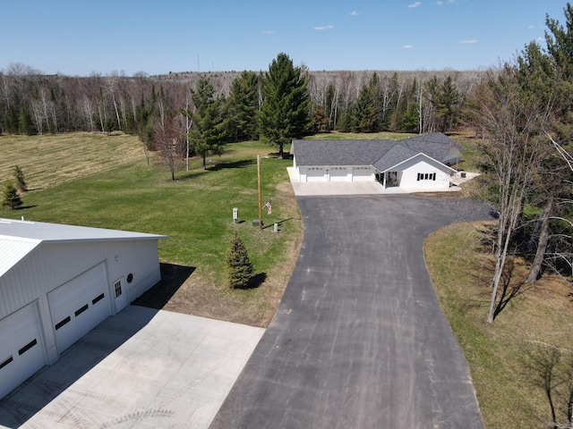 view from above of property featuring a forest