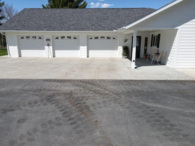 garage with driveway