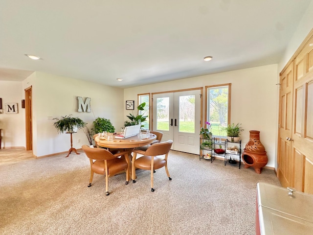 27722 Mallum Dr, Trout Lake Twp, MN 55709 - dining room with french doors, light colored carpet, baseboards, and recessed lighting