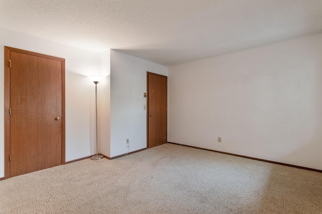 2220 Ridge Dr Unit 11, Saint Louis Park, MN 55416 - unfurnished room featuring light colored carpet and baseboards