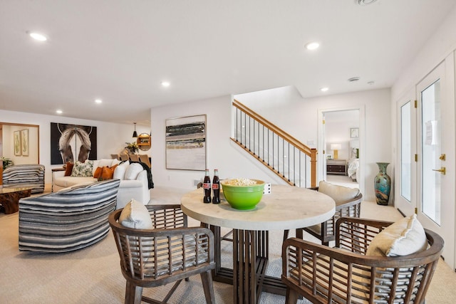 dining area featuring stairway, carpet floors, and recessed lighting