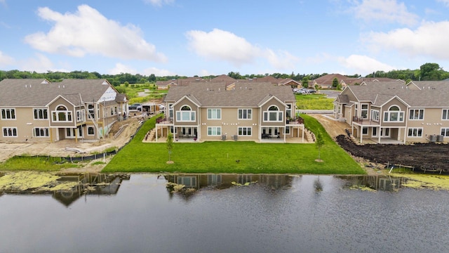 aerial view of residential area with a nearby body of water