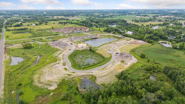 aerial view of property's location with a nearby body of water