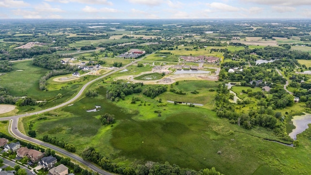 aerial view of property's location featuring a nearby body of water