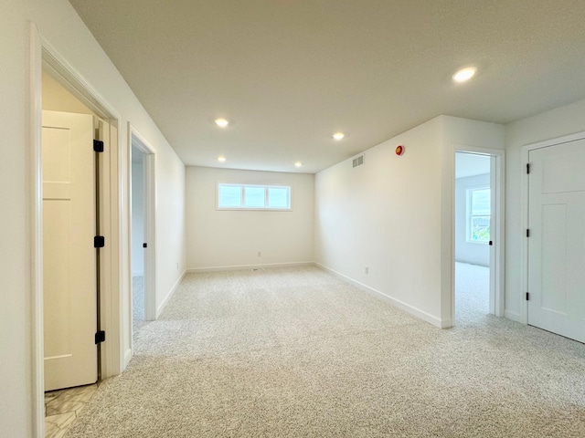 7499 Odell Ave NE, Otsego, MN 55330 - unfurnished room with light carpet, recessed lighting, and baseboards