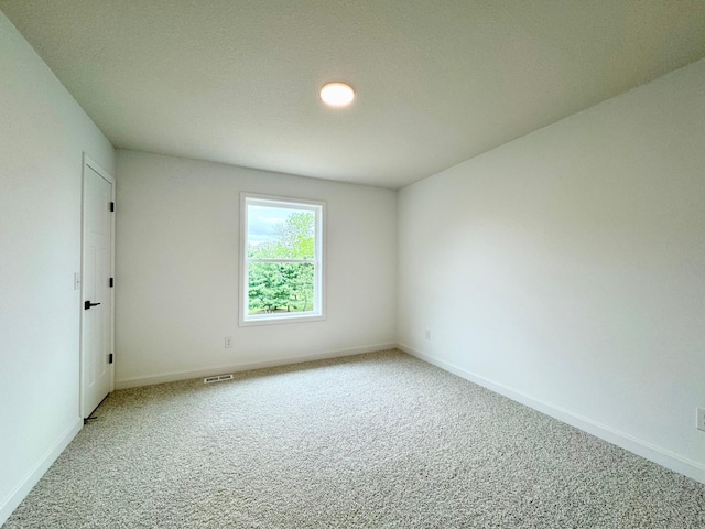 7499 Odell Ave NE, Otsego, MN 55330 - carpeted empty room with baseboards