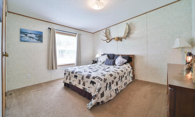 carpeted bedroom with ornamental molding and a textured ceiling