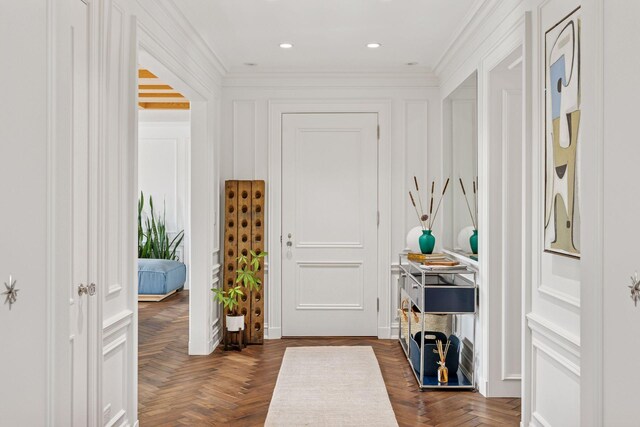 510 Groveland Ave Unit 304, Minneapolis, MN 55403 - foyer entrance featuring crown molding, a decorative wall, and recessed lighting
