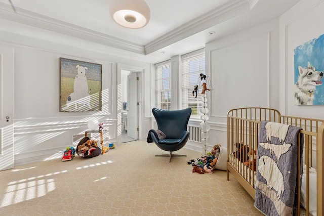 510 Groveland Ave Unit 304, Minneapolis, MN 55403 - sitting room featuring a decorative wall, crown molding, carpet, a tray ceiling, and a wainscoted wall