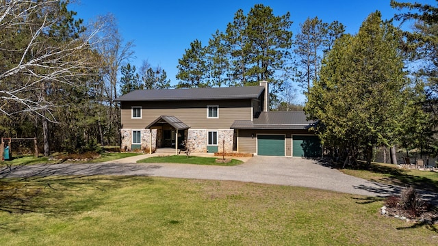 27088 130th St, Thomastown Twp, MN 56479 - traditional-style home featuring a chimney, driveway, an attached garage, a front yard, and metal roof