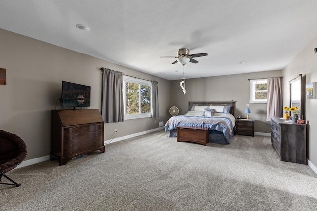 27088 130th St, Thomastown Twp, MN 56479 - carpeted bedroom with multiple windows, baseboards, and a ceiling fan