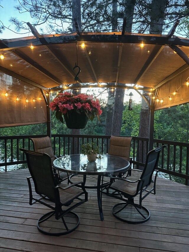 27088 130th St, Thomastown Twp, MN 56479 - wooden terrace featuring outdoor dining space