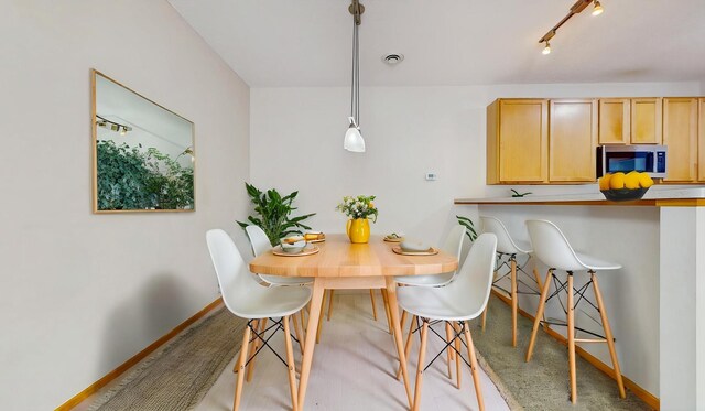 9640 Peony Ln N, Maple Grove, MN 55311 - dining space featuring baseboards