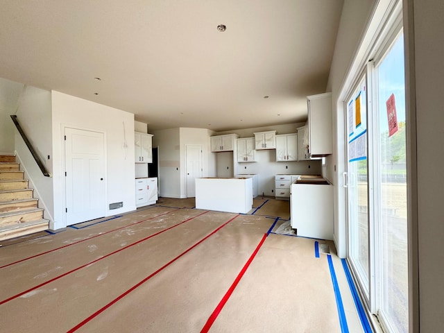 14608 74th St NE, Otsego, MN 55330 - unfurnished living room featuring stairway