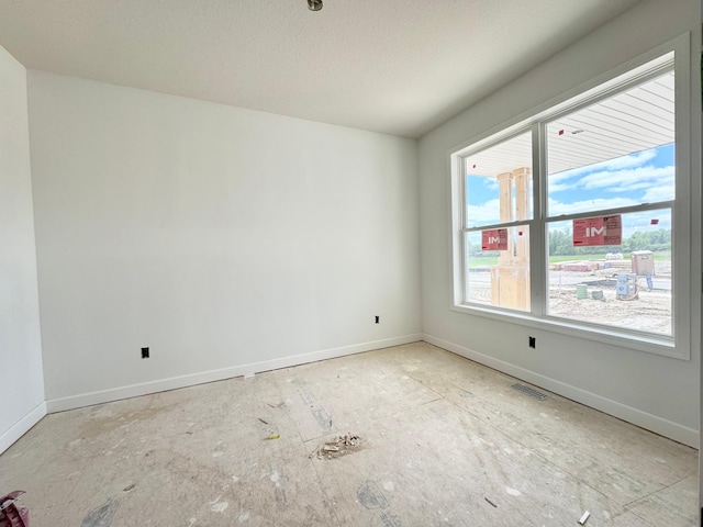 14608 74th St NE, Otsego, MN 55330 - unfurnished room featuring baseboards