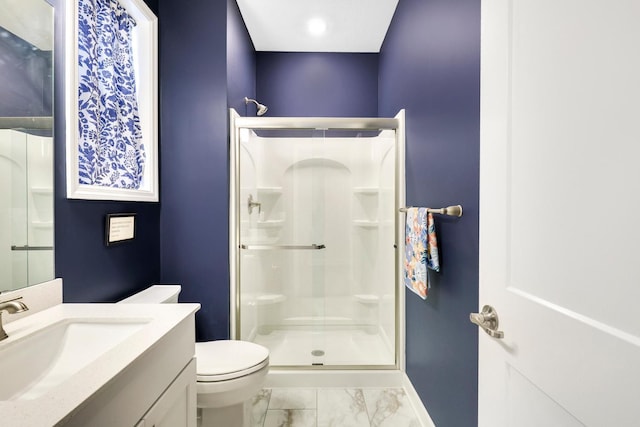 13404 Avila Ave, Rosemount, MN 55068 - full bathroom with a stall shower, marble look tiles, vanity, toilet, and baseboards