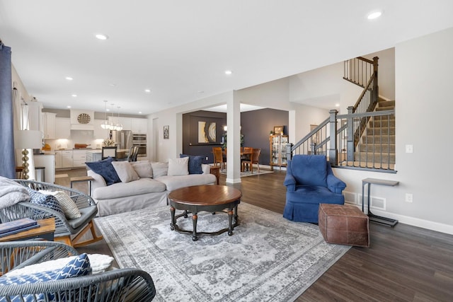 13404 Avila Ave, Rosemount, MN 55068 - living room featuring dark wood-style floors, stairway, baseboards, and recessed lighting